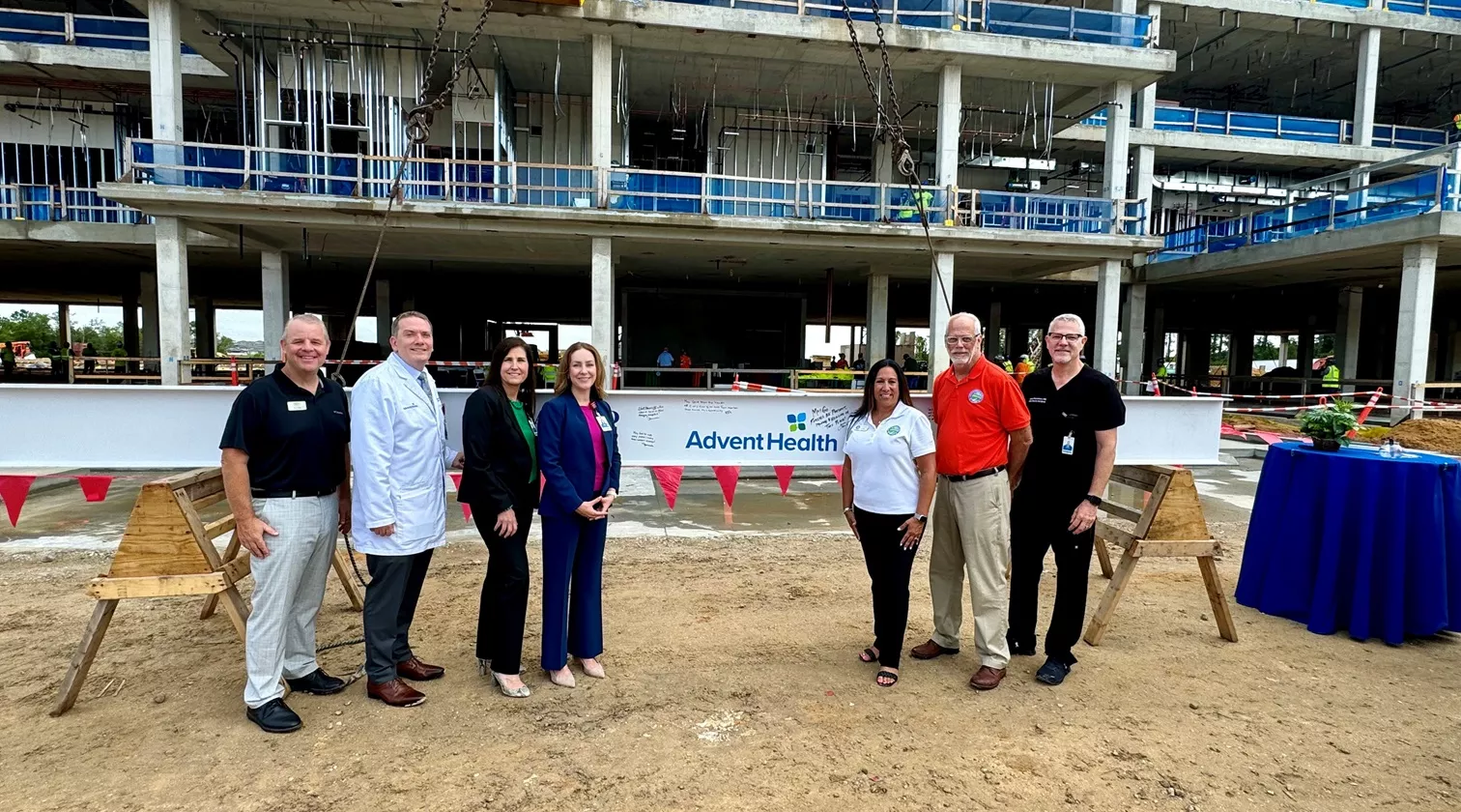 Leaders at AdventHealth Minneola topping-out ceremony