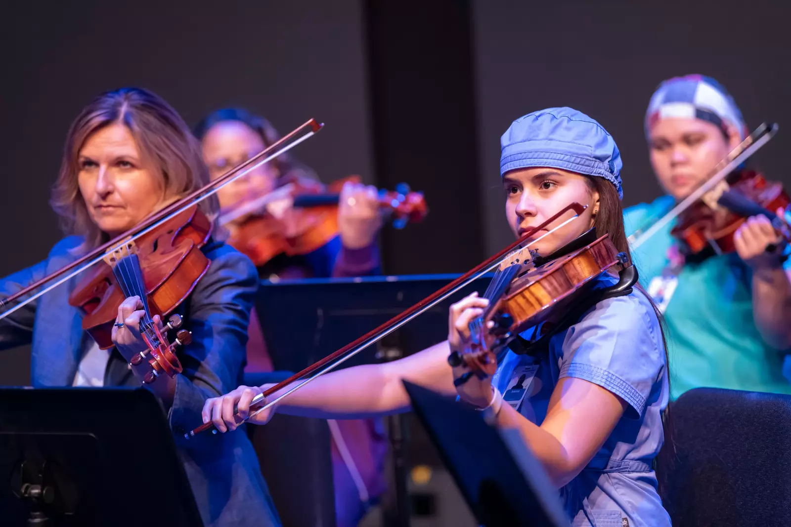 The AdventHealth employee orchestra performs a requiem performance.