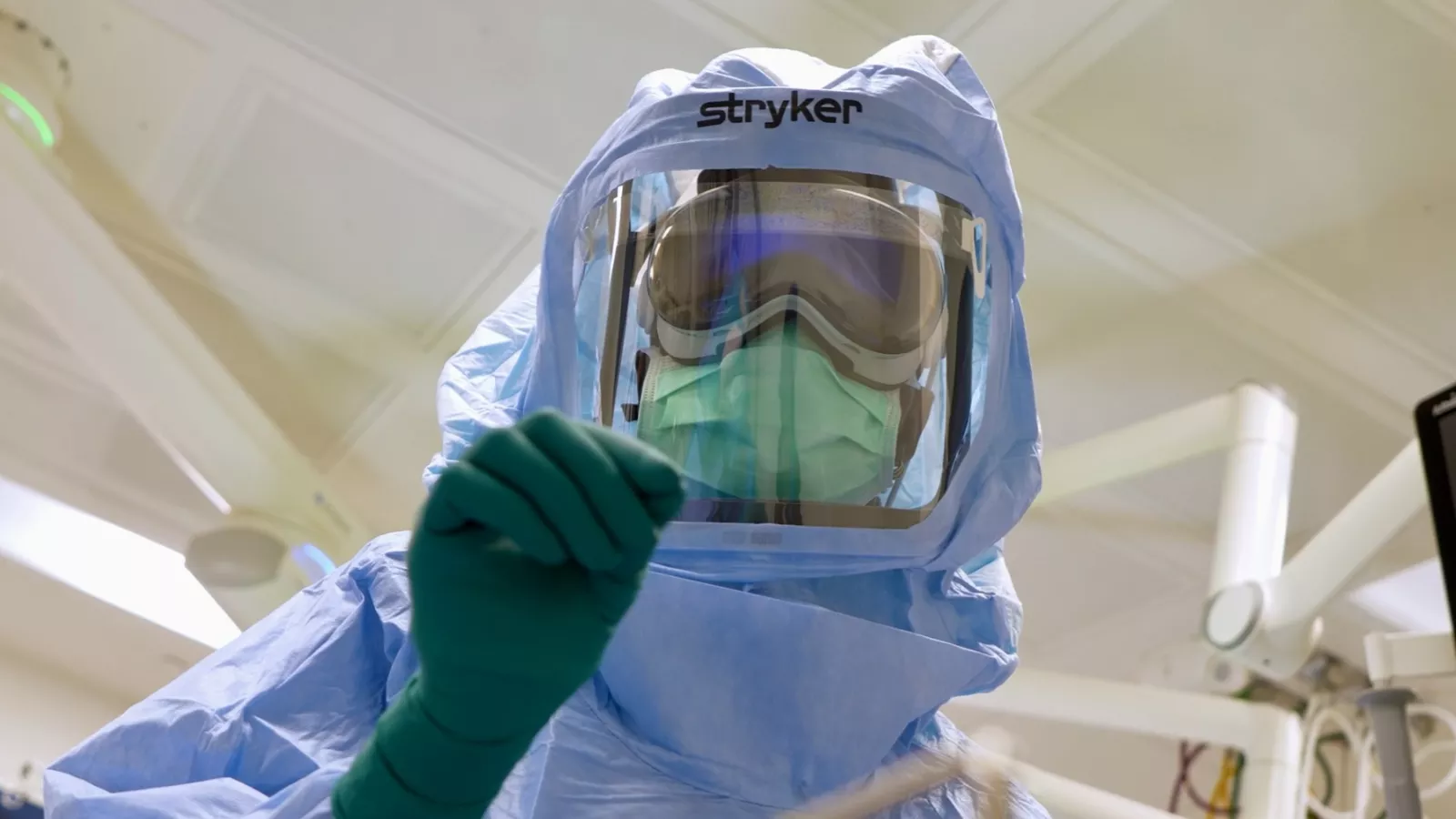 AdventHealth surgical tech, Natasha Francois, dons sterile suit and uses innovative Apple Vision Pro based surgical assist system