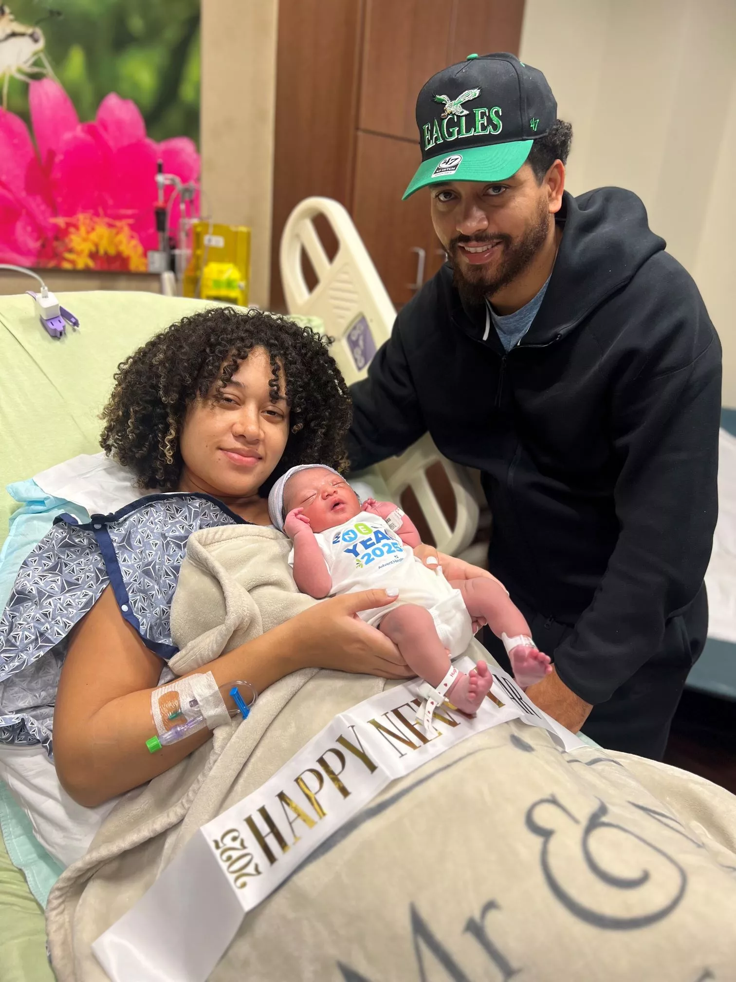 Proud parents hold Baby Jeeno moments after he came into the world!