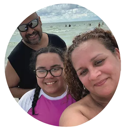 A father, mother and child at the beach