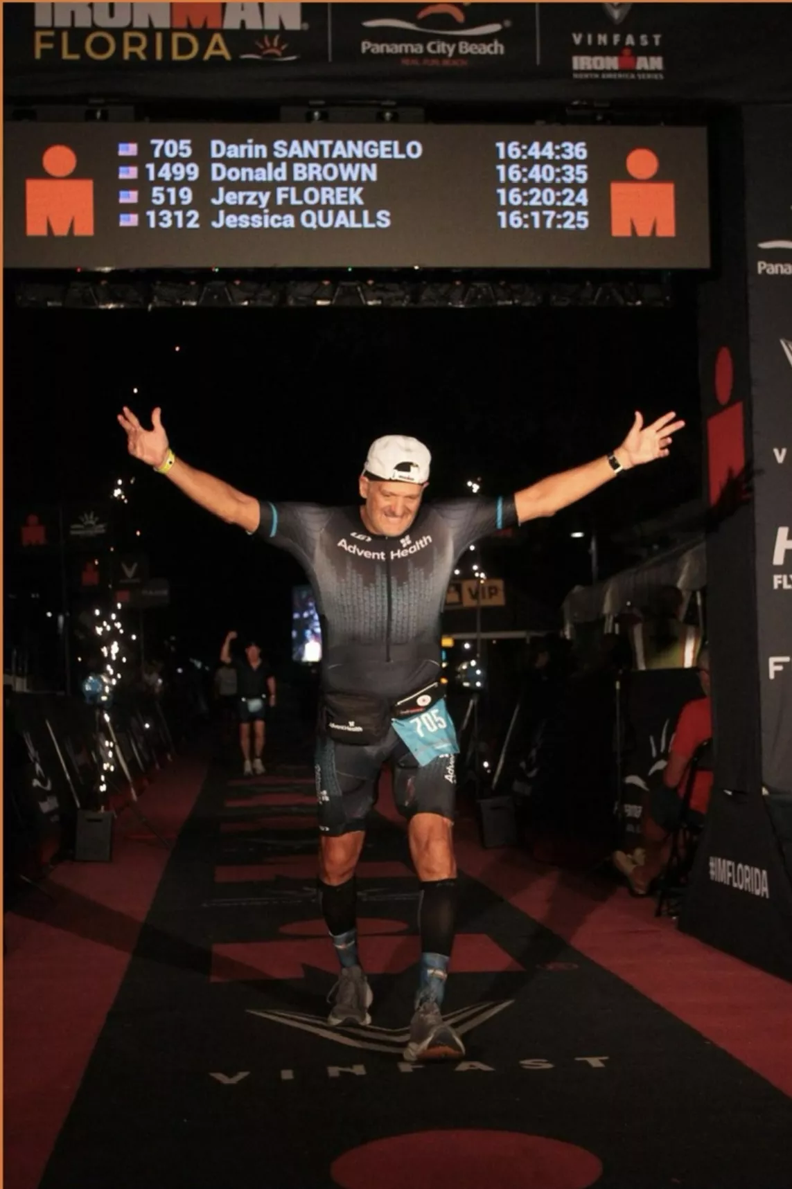 Darin Santangelo at Ironman finish line