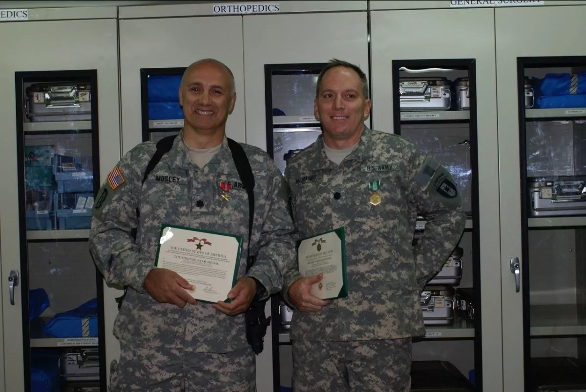 Dr. E. Wayne Mosley (left) was awarded a Bronze Star for his service. He also was awarded the Combat Medic Badge and Combat Action Badge. Photo Courtesy of Dr. E. Wayne Mosley