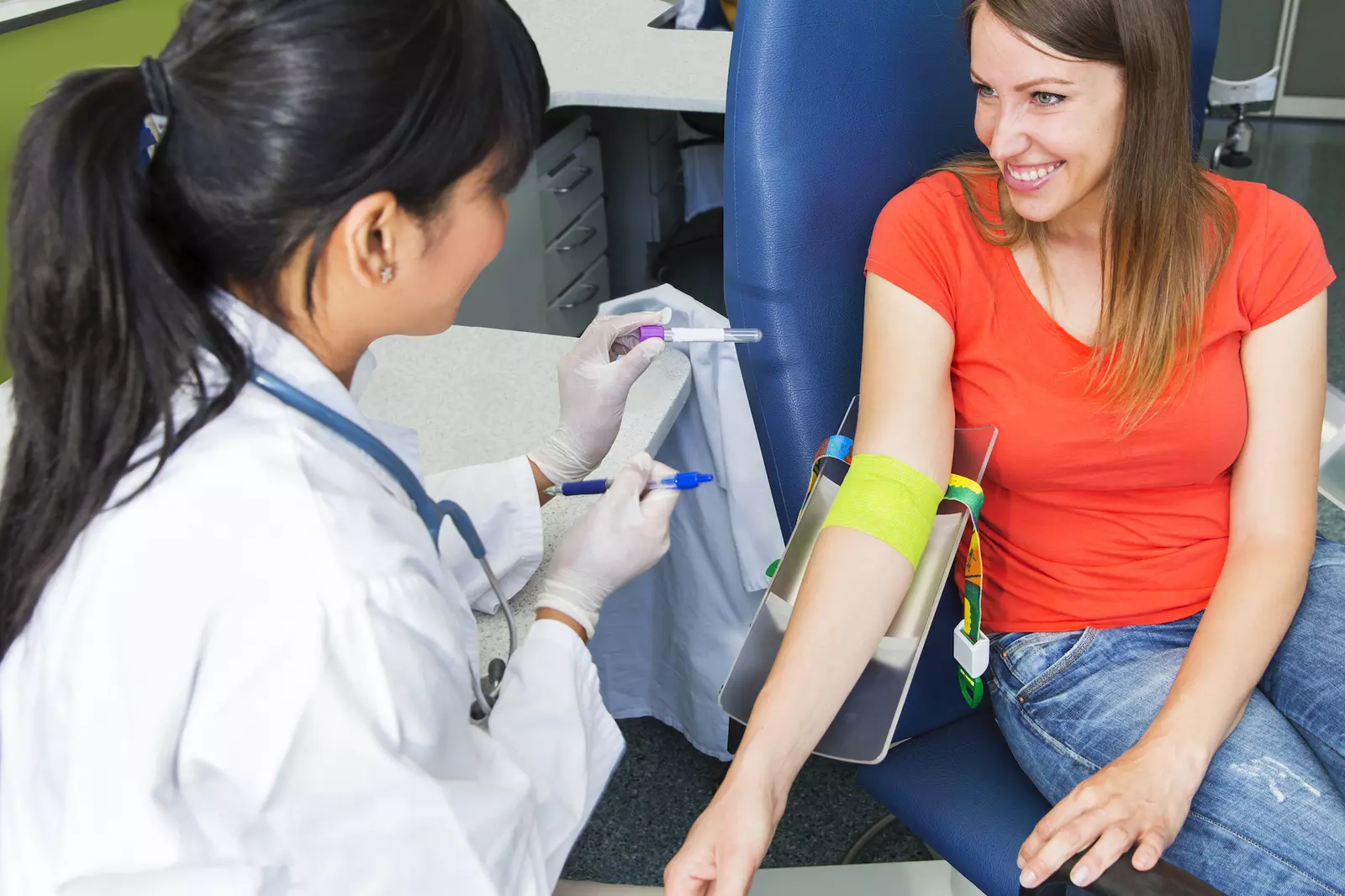 Woman preparing to have her blood drawn