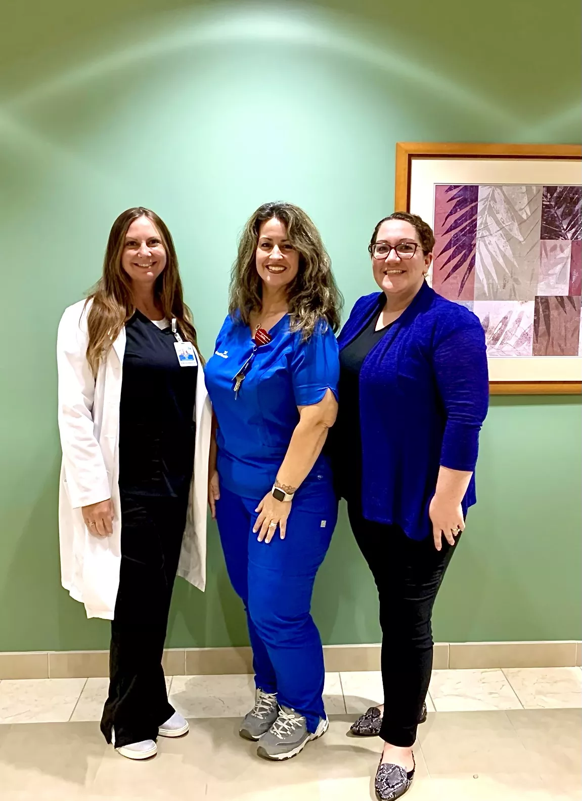 Cianciotto standing with Alexis Cox, APRN, and Michelle Sanborn, director of care management at AdventHealth Daytona Beach. 