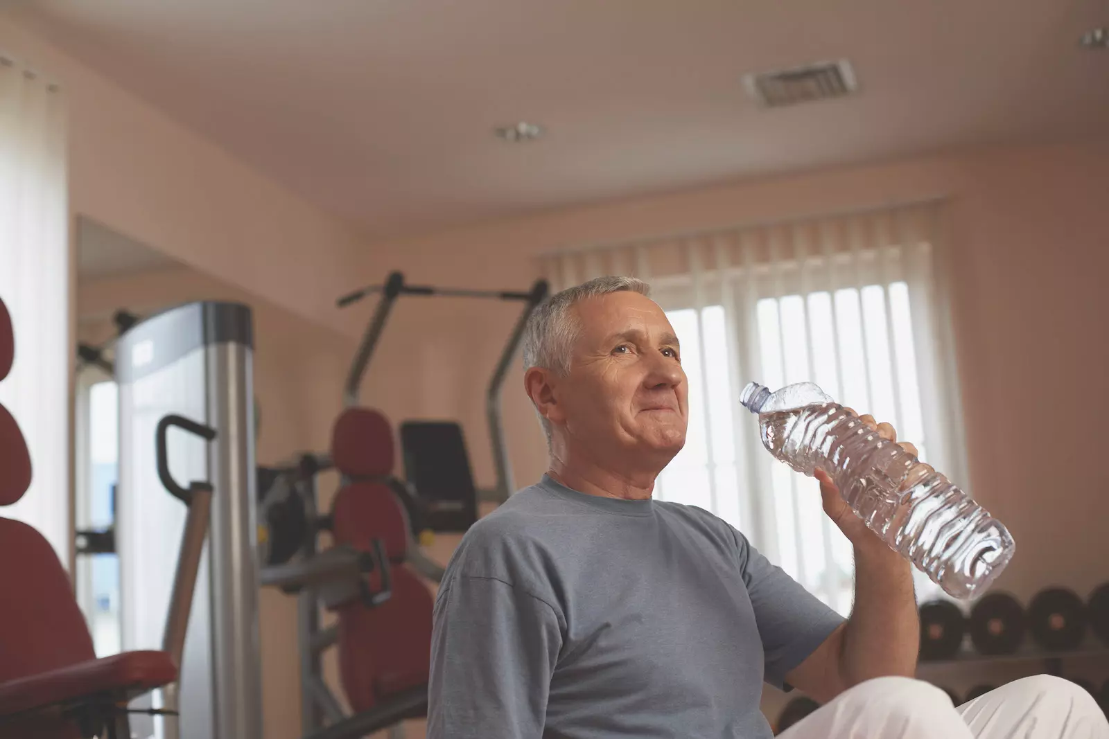 man drinks water to stay health