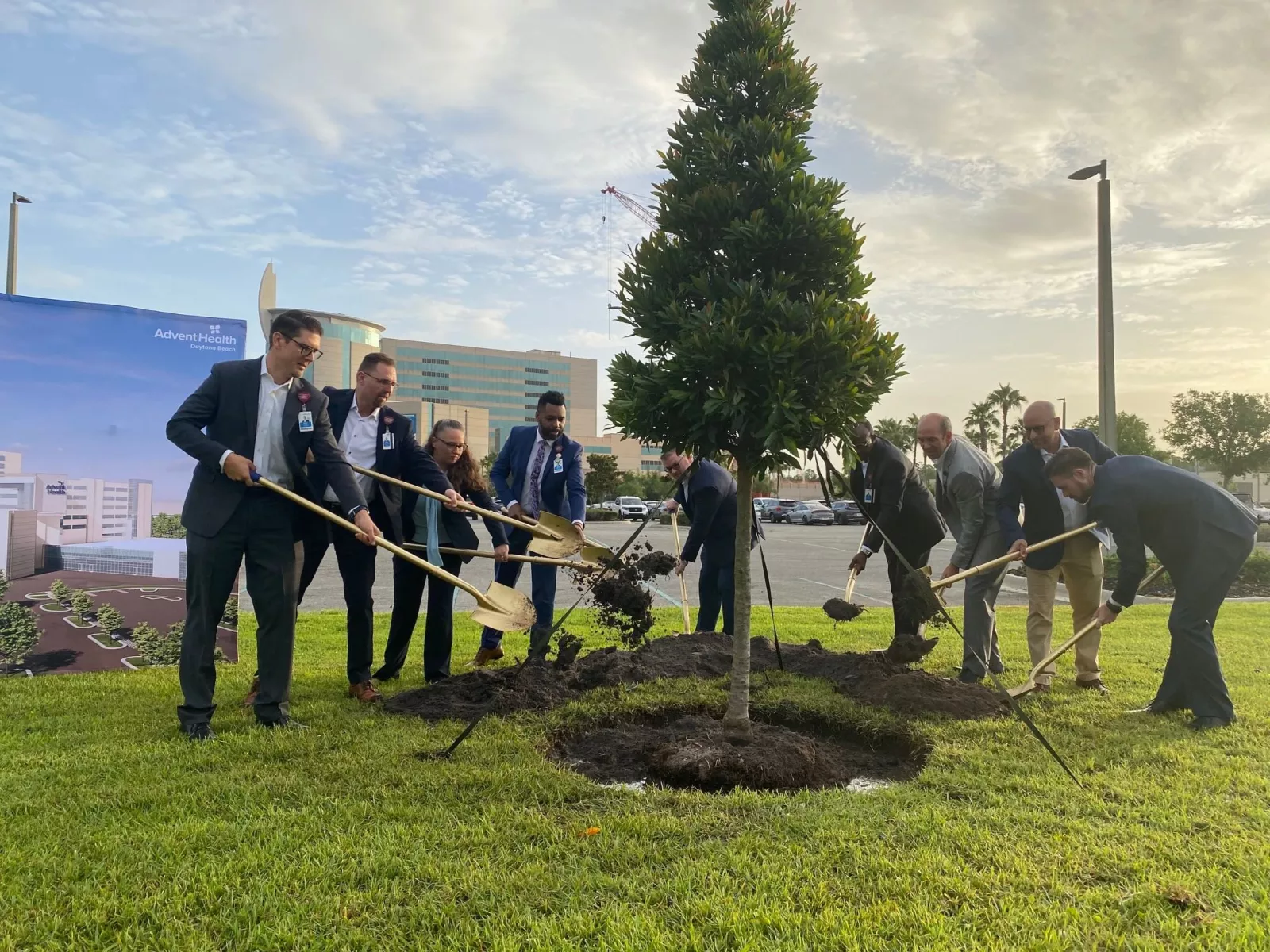 AdventHealth Daytona Beach kicks off construction project with a tree planting.