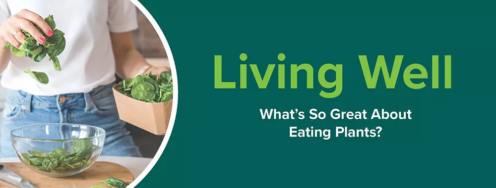 banner of living well title with image of woman holding spinach