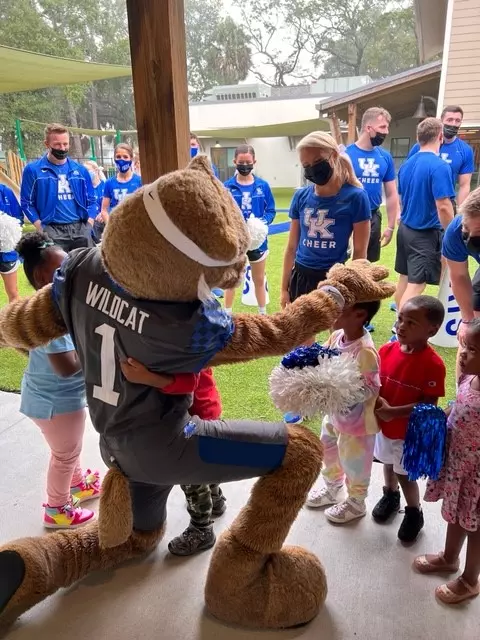University of Kentucky Wildcat greets preschoolers at AdventHealth's West Lakes Early Learning Center in Orlando.