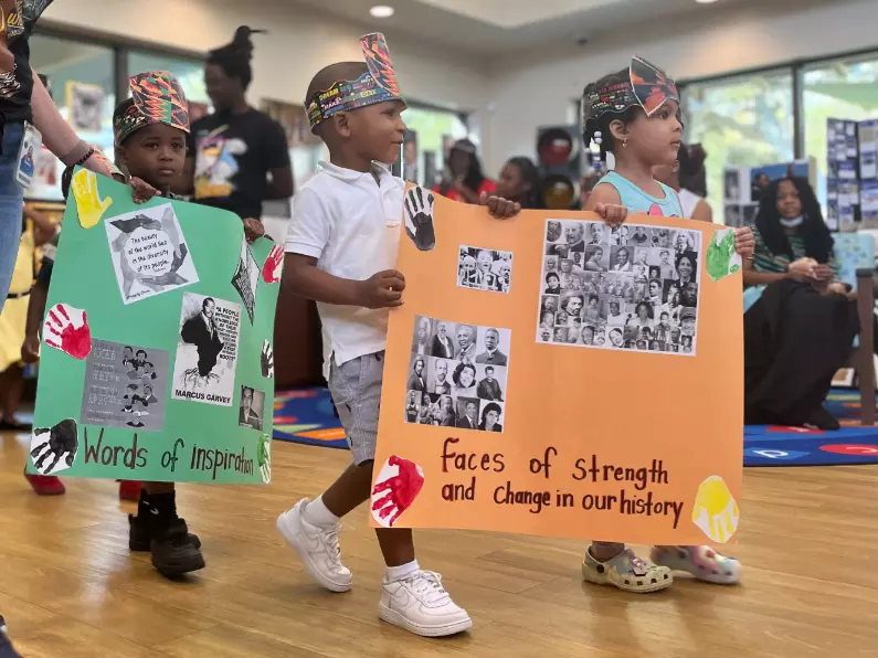 Kids participate in AdventHealth for Children's West Lakes ELC parade honoring Black history heroes.