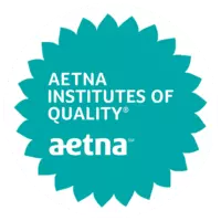 Aetna's circular turquoise badge with sunflower frills around it